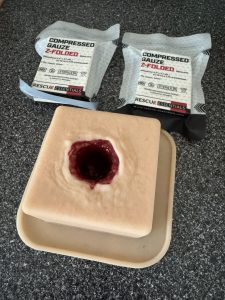 wound packing trainer with z fold gauze